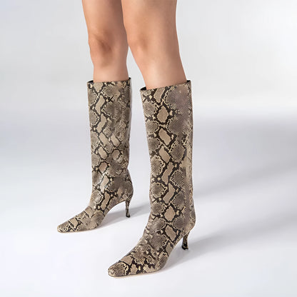 A pair of women's square toe cowboy boots in microfiber, shown in a selection of available colours.