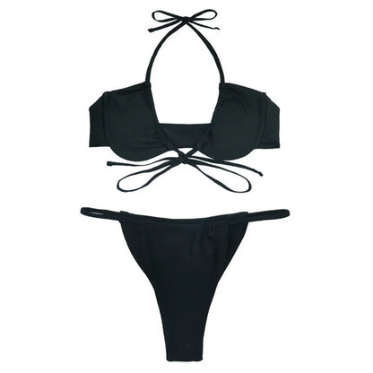Women's black and mint green nylon bikini swimsuit set on a white background.