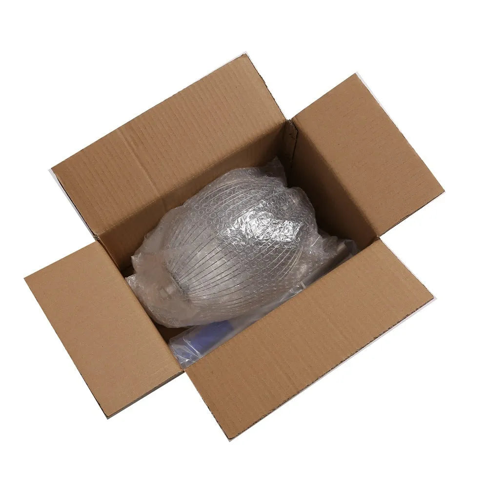 Stainless steel golf ball picker in metallic colour on a green background.