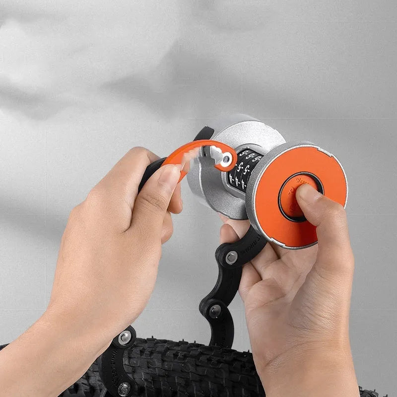 Portable bicycle folding lock in black and black orange colours showing folding mechanism