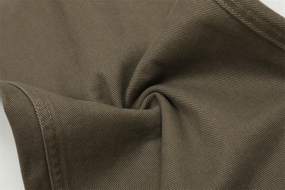 Men's cotton denim work trousers with mid waist, shown in black, brown and coffee, sizes XS to XXL for youth leisure wear.