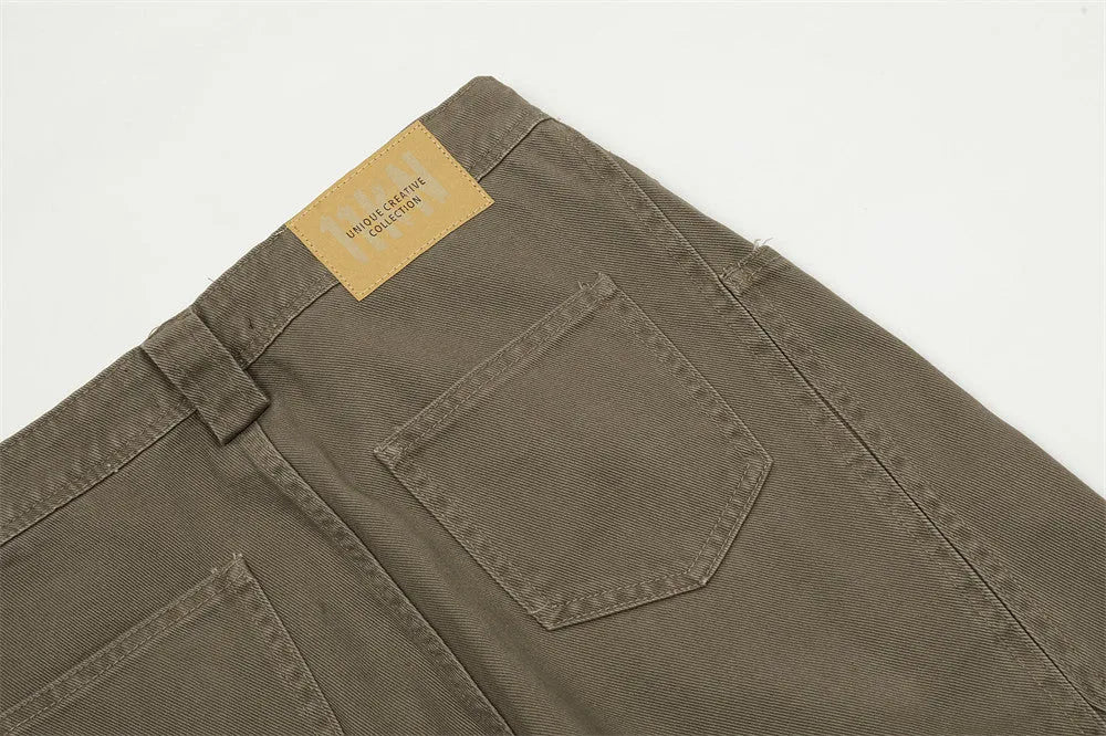 Men's cotton denim work trousers with mid waist, shown in black, brown and coffee, sizes XS to XXL for youth leisure wear.