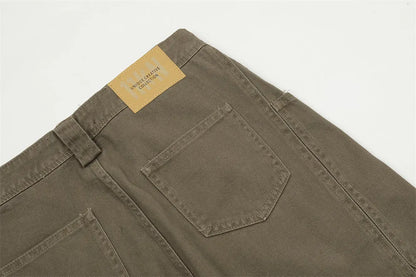 Men's cotton denim work trousers with mid waist, shown in black, brown and coffee, sizes XS to XXL for youth leisure wear.