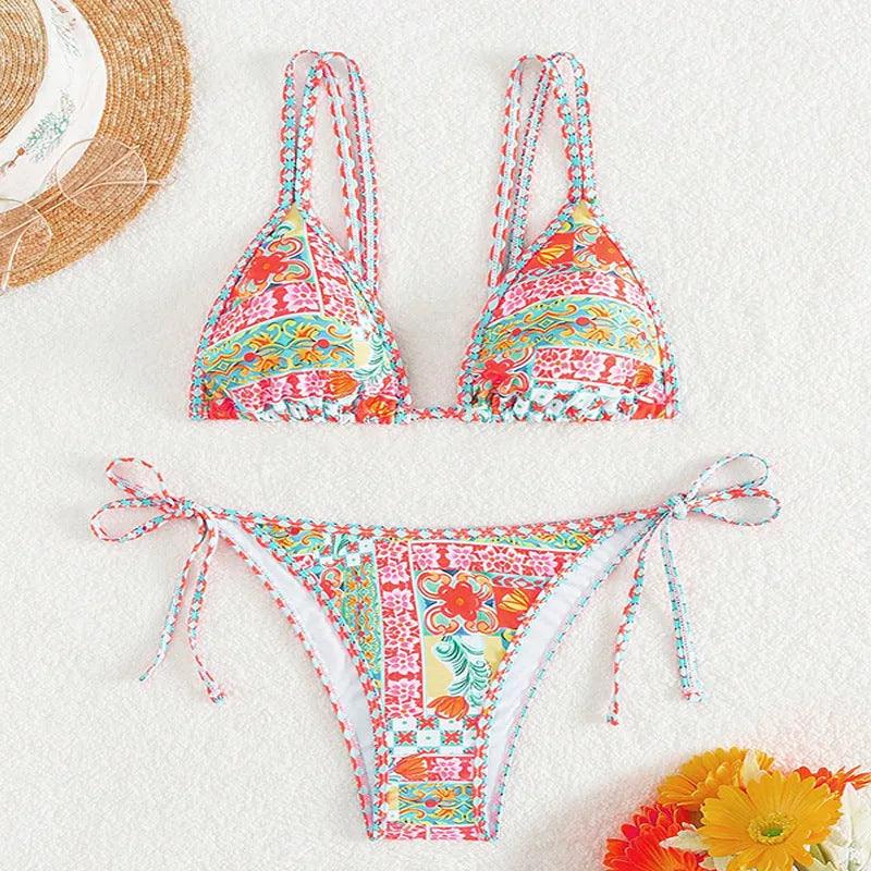 Women's lace-up front split design swimsuit bikini set in polyester with spandex lining.