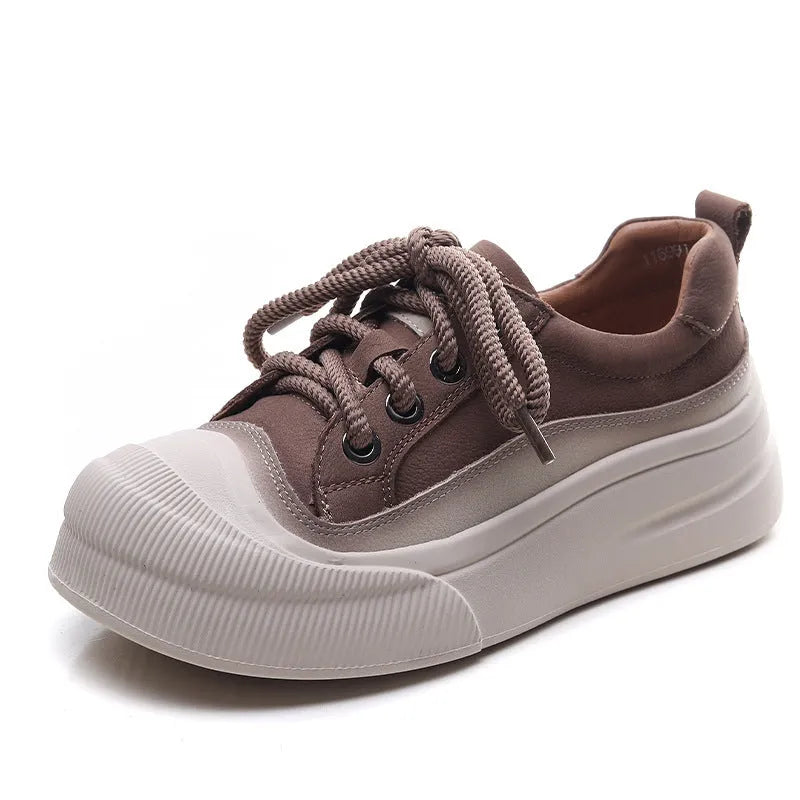 Women's brown leather lace-up casual shoes with round toe and rubber sole on white background