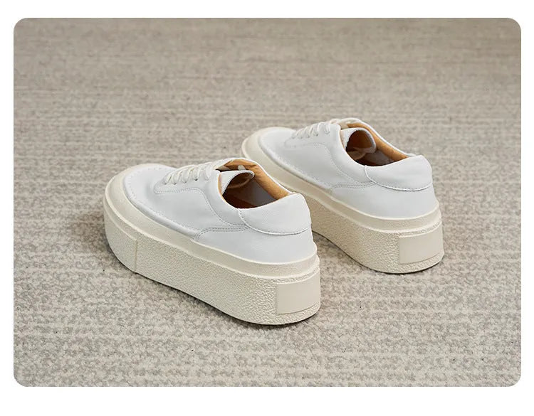 Women's black and white cowhide platform casual shoes with round toe and rubber sole