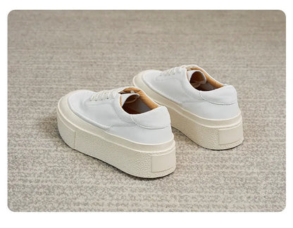 Women's black and white cowhide platform casual shoes with round toe and rubber sole