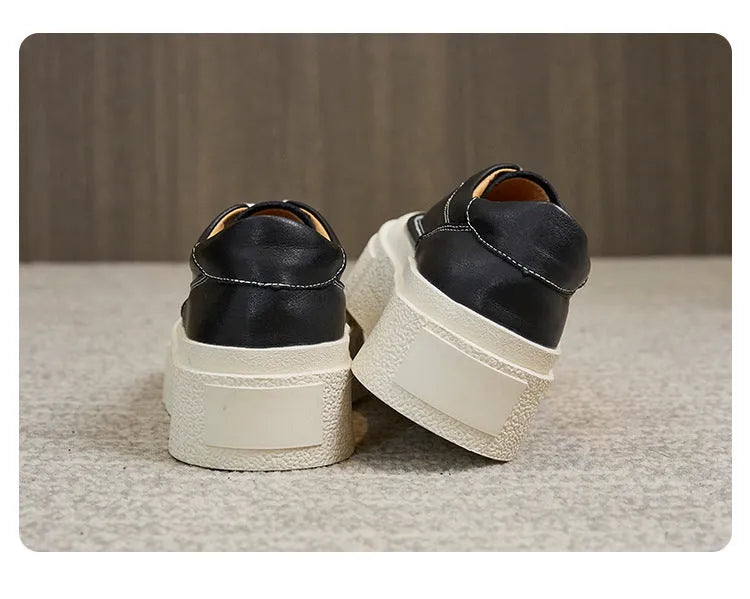 Women's black and white cowhide platform casual shoes with round toe and rubber sole