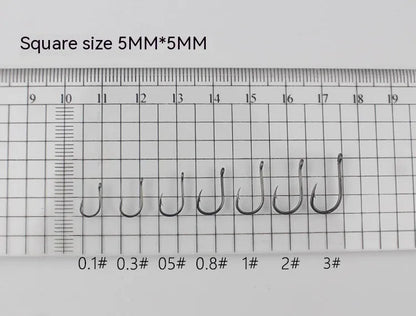 Bulk pack of alloy carbon steel sea fishing hooks with barbed crooked mouth design in various sizes.