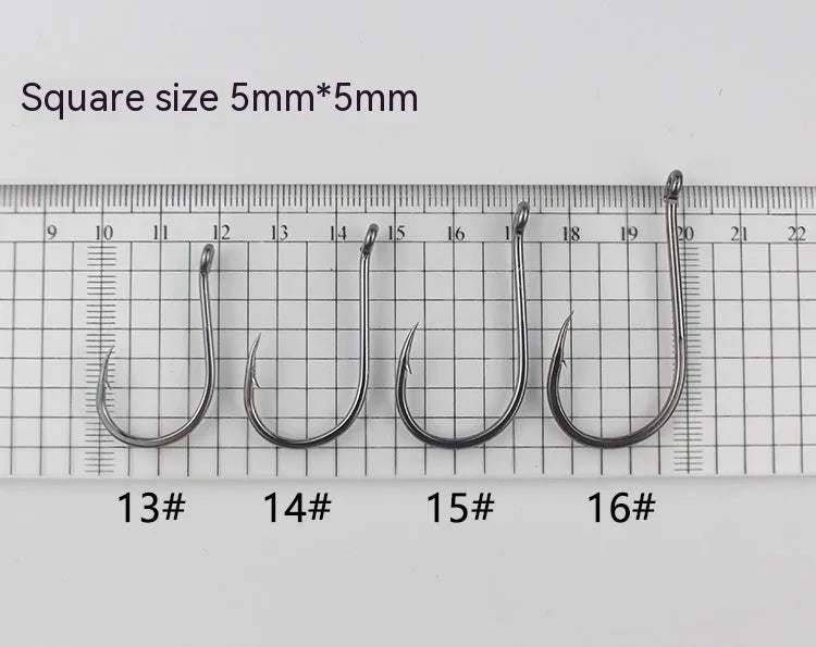 Bulk pack of alloy carbon steel sea fishing hooks with barbed crooked mouth design in various sizes.
