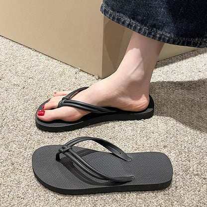 PVC injection moulded flip flops in toe-covering casual style with non-slip sole