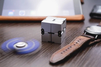 Infinity Cube decompression toy in zinc alloy with 360-degree rotation capability