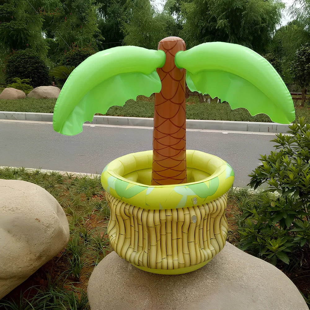 Green inflatable palm tree shaped cooler with coconut details holding beer bottles and ice
