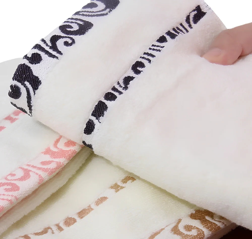 Pure cotton jacquard face towel measuring 33x73cm with textured patterns and twistless yarn construction