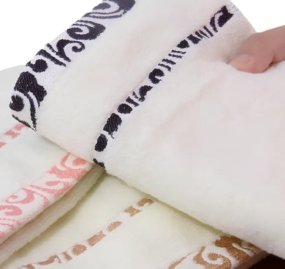 Pure cotton jacquard face towel measuring 33x73cm with textured patterns and twistless yarn construction