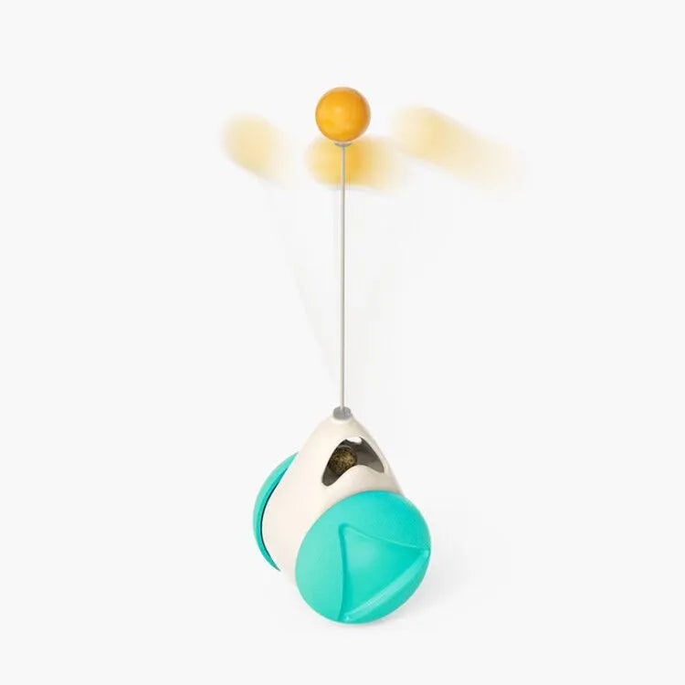 Cat rotating windmill toy with suction base, two transparent bins, blue and yellow-green TPR body.
