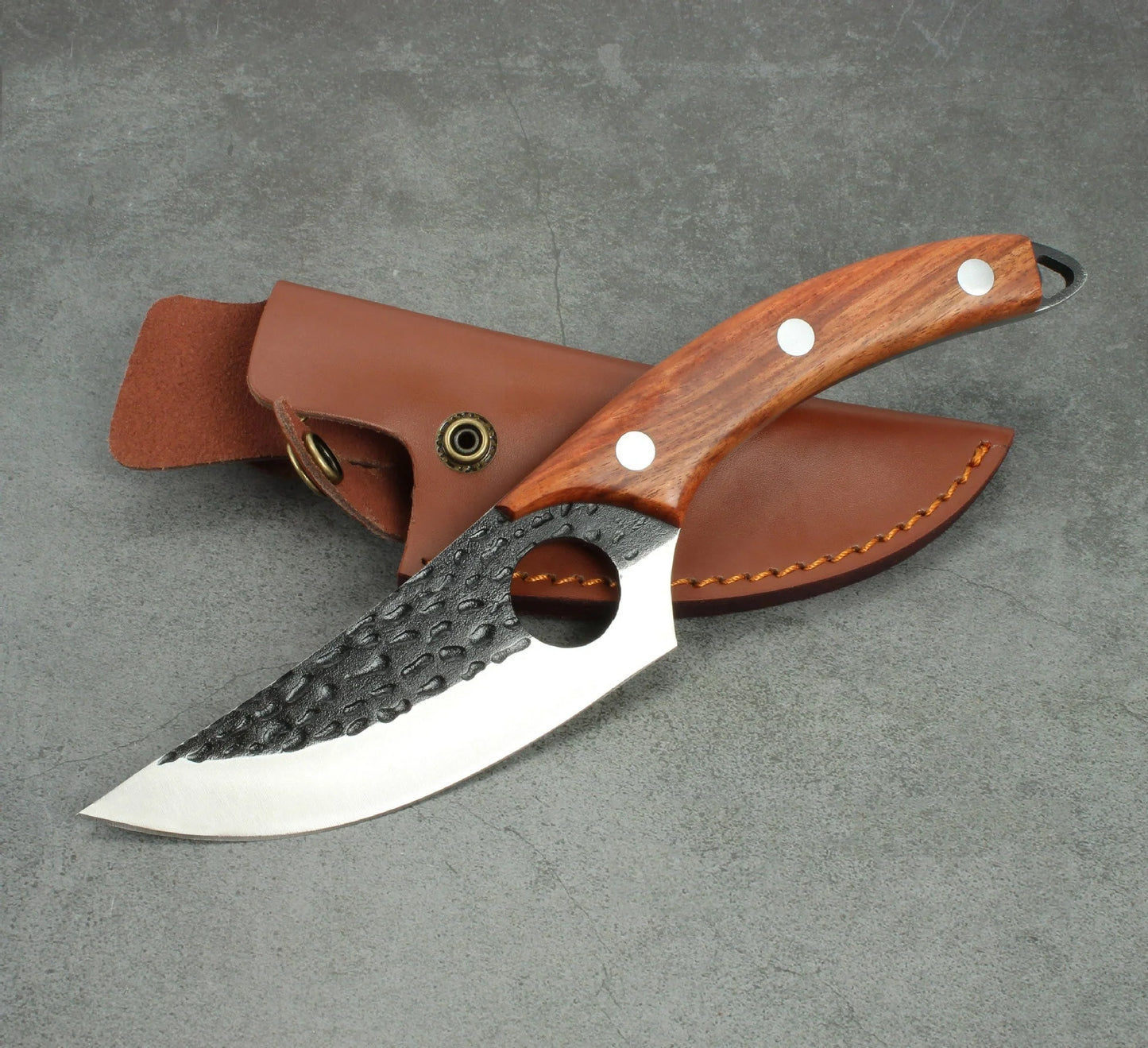 Handcrafted stainless steel boning knife with ergonomic handle for precision cooking tasks