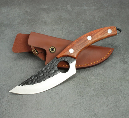 Handcrafted stainless steel boning knife with ergonomic handle for precision cooking tasks