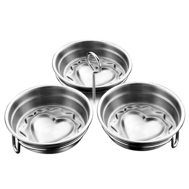 Heart-shaped stainless steel egg steamer with compact 15cm dimensions and 1.5-litre cooking capacity