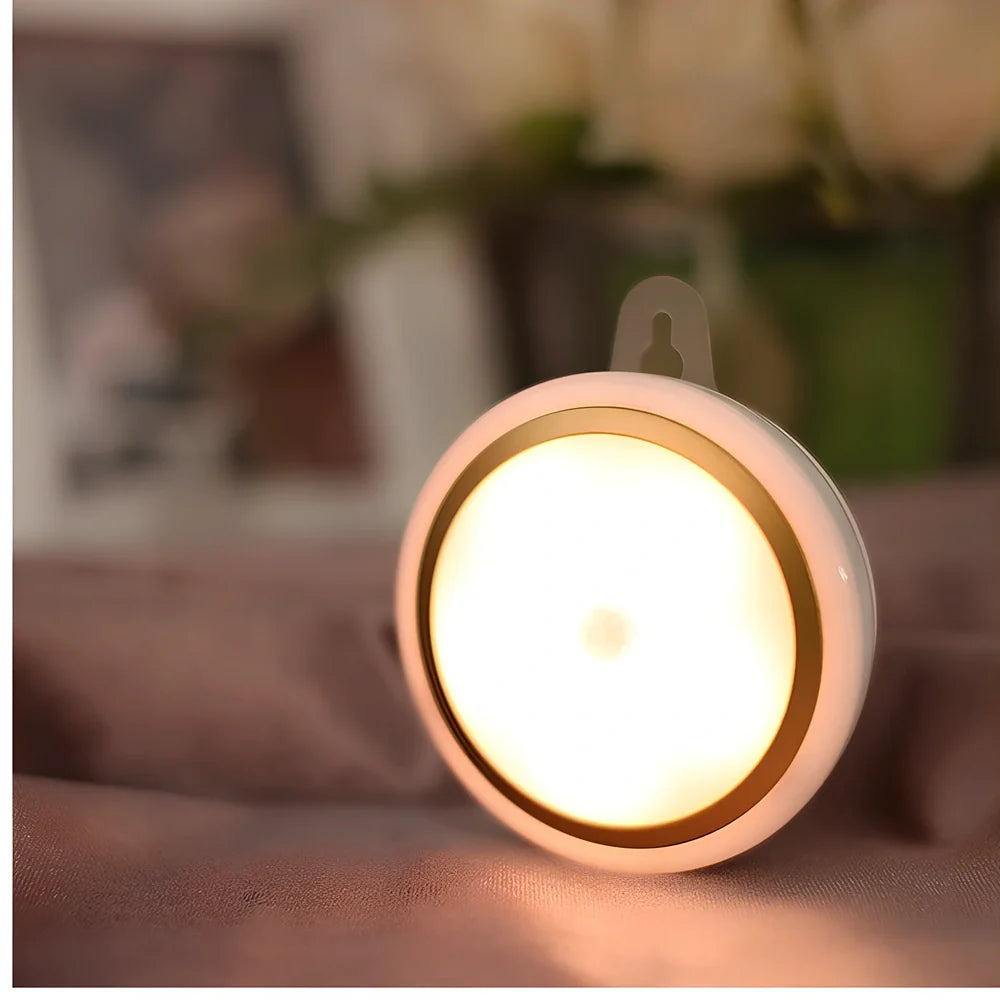 Round white motion sensor LED light with 80mm diameter for wardrobe and corridor lighting