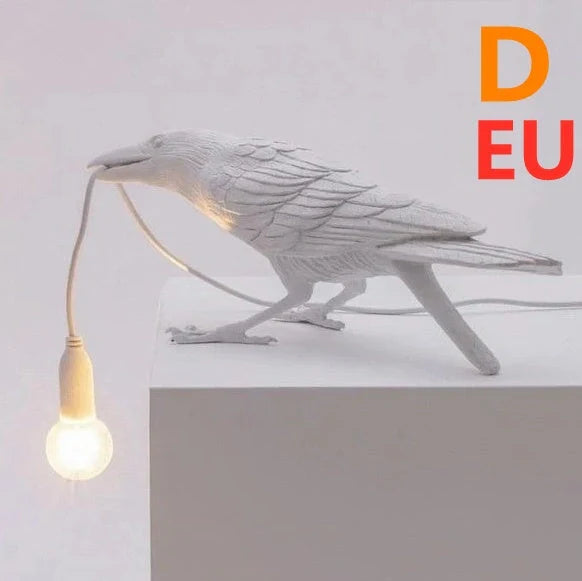 Elegant Resin Bird Wall Lamp illuminating a cozy room with its unique design