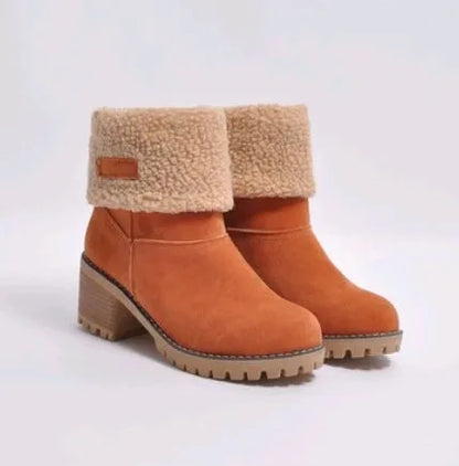 Mid-tube thick heel suede snow boots in black with beef tendon sole and waterproof platform.