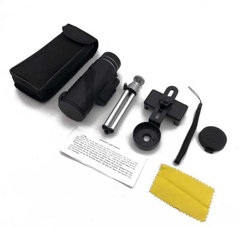 Black HD 40x60 monocular telescope with 60mm objective lens on a table.