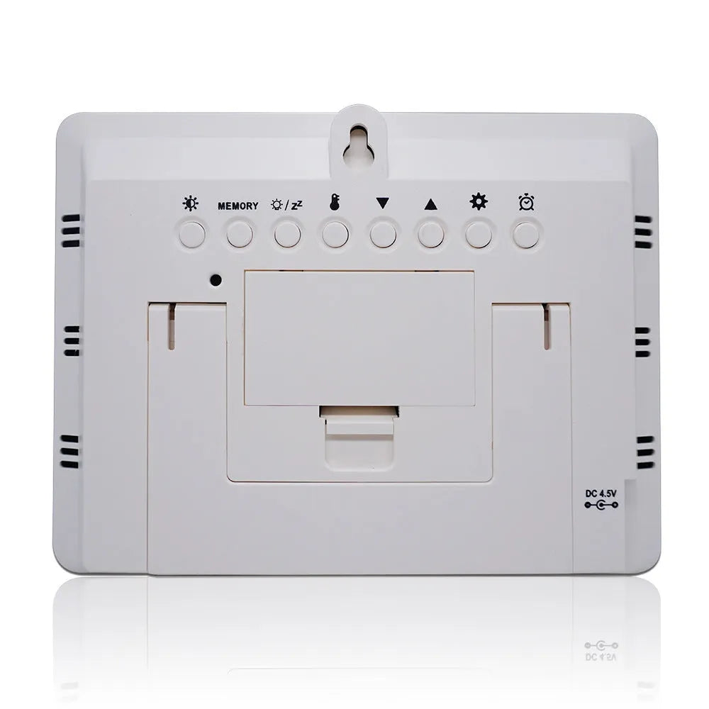 Rectangular LCD weather station showing temperature, humidity and weather forecast data