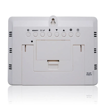 Rectangular LCD weather station showing temperature, humidity and weather forecast data