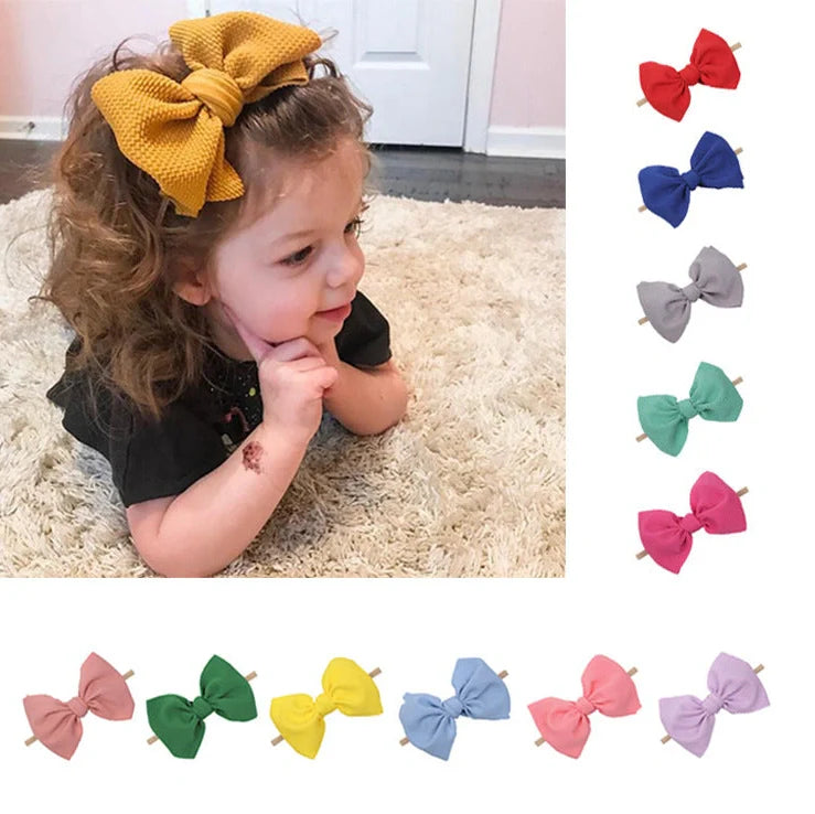 Children's waffle fabric bow hair accessory headband in multiple colour options