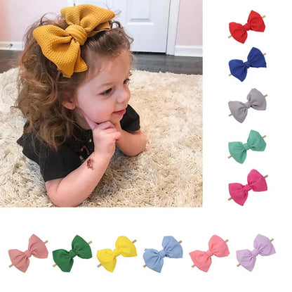 Children's waffle fabric bow hair accessory headband in multiple colour options