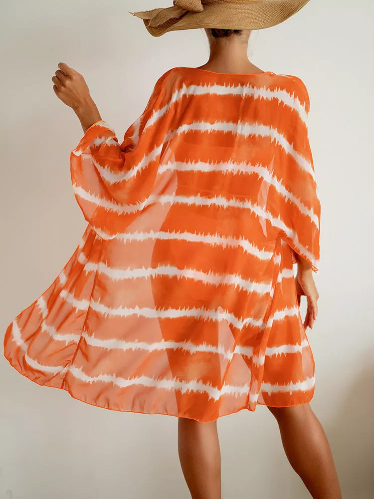 Women's chiffon three piece swimsuit with color blocking pattern and cardigan