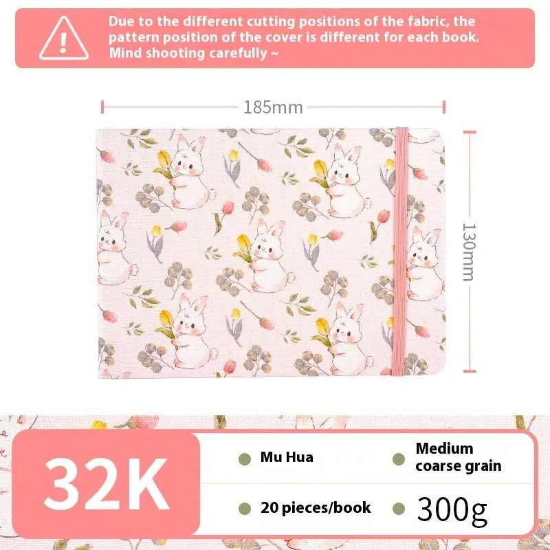 Feiluniao watercolour notebook with fabric cover, 185mm length, open to show paper for painting.