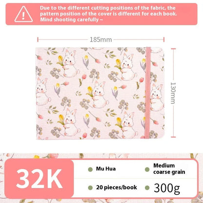 Feiluniao watercolour notebook with fabric cover, 185mm length, open to show paper for painting.