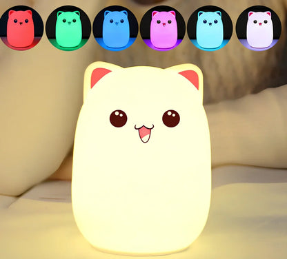 Cartoon silicone night lamp with clap activation in blue or pink, dimensions 100x100x135mm