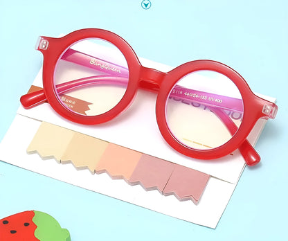 Retro round frame anti blue light glasses in various colours on a plain background