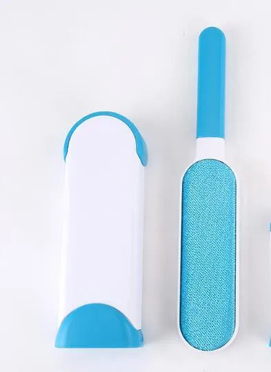Blue reusable pet hair removal comb with sticky brush and self-cleaning base for sofas.