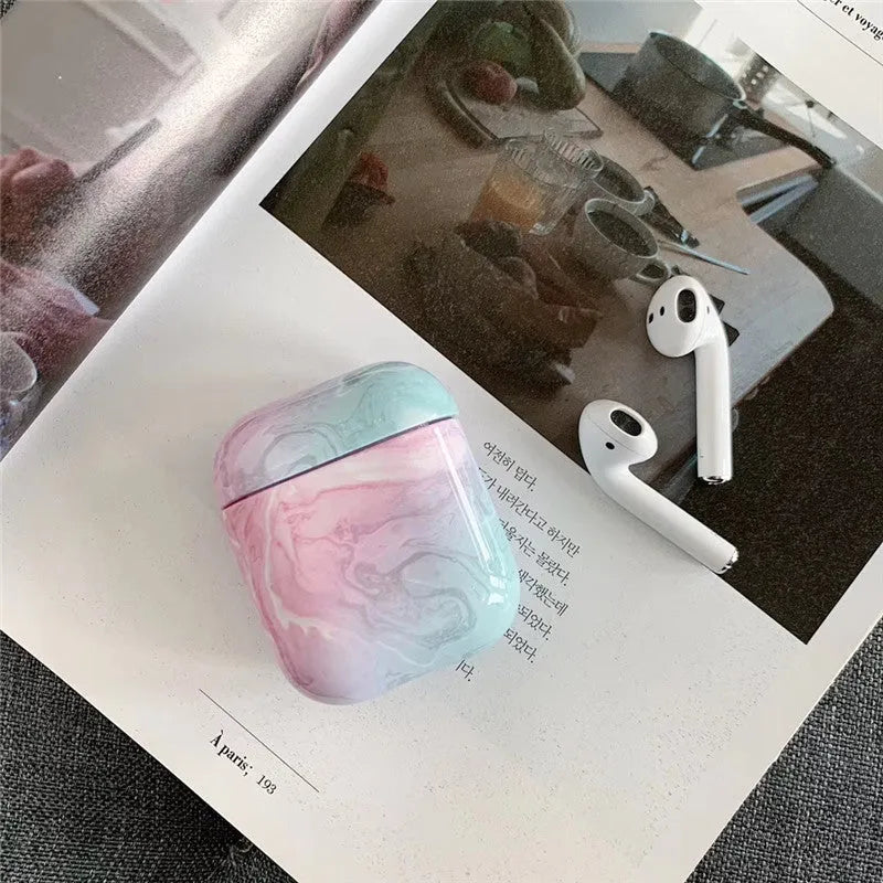 White marble hard PC protective case for AirPods charging box showing scratch protection
