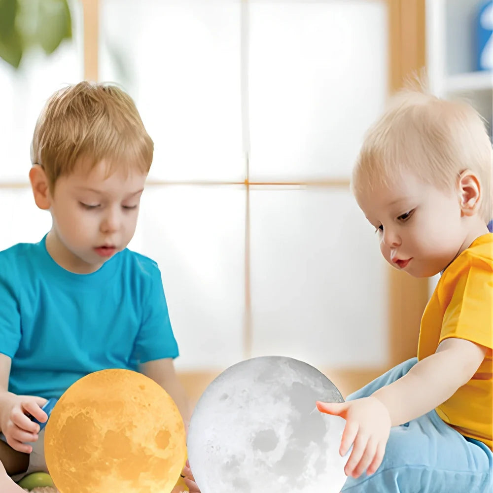 3D printed moon night light with detailed lunar surface and dual-colour LED lighting on beech wood stand