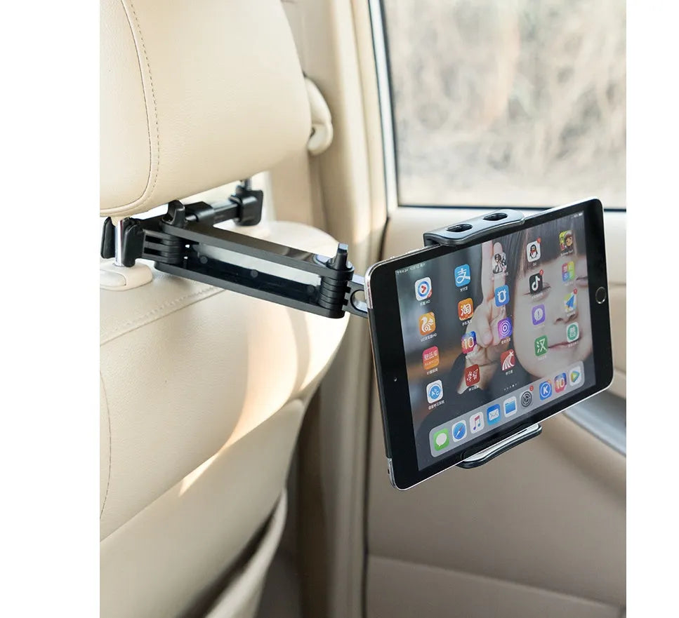 Black car tablet holder mounted on vehicle rear seat base holding iPad