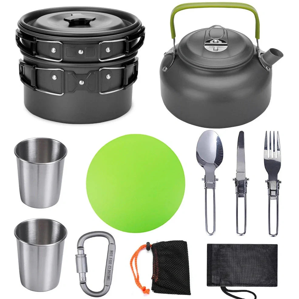 Outdoor camping cookware set with saucepan, frying pan, teapot, and stainless steel cups in mesh storage bag