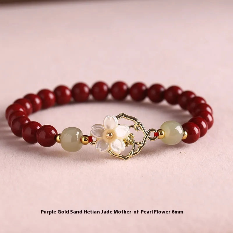 Hetian Jade New Chinese Style Bracelet made from natural cinnabar featuring white butterfly and bells of Ireland motifs with lotus elements, purple gold sand or emperor sandstone colour options in 6mm 17cm, 8mm 18cm or 10mm 18cm sizes for women