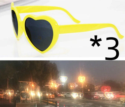 Stylish heart-shaped lighting sunglasses with a plastic frame and resin lenses, creating a mesmerizing effect for romantic occasions