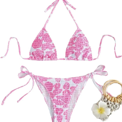 Women's floral halter neck swimsuit set in polyester fabric showing bra top and briefs