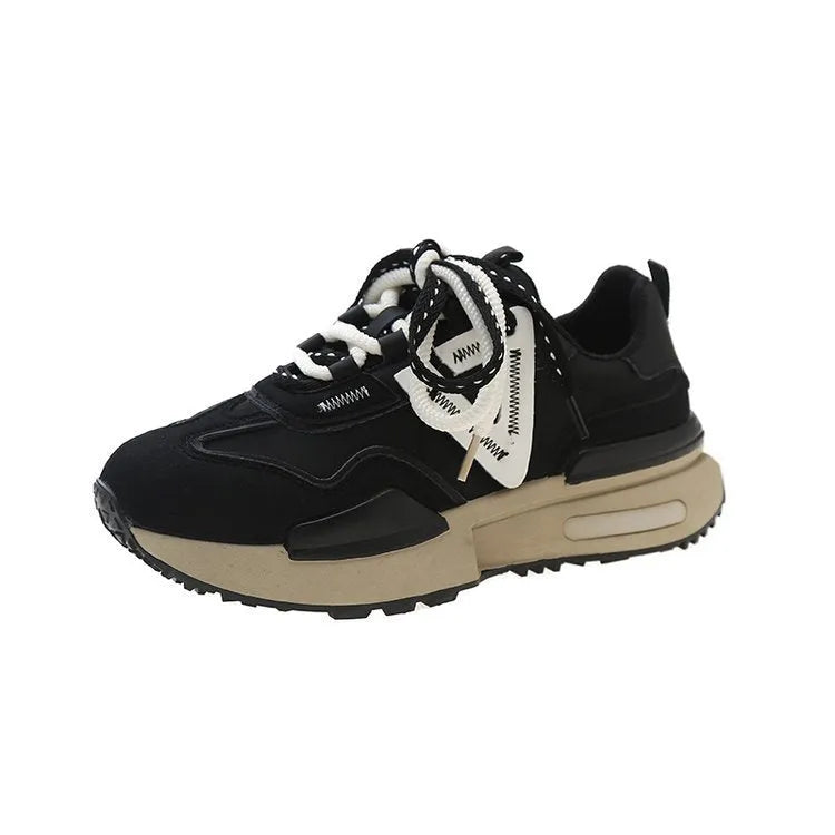 Women's black retro platform sports shoes with round toe and front lace-up fastening.