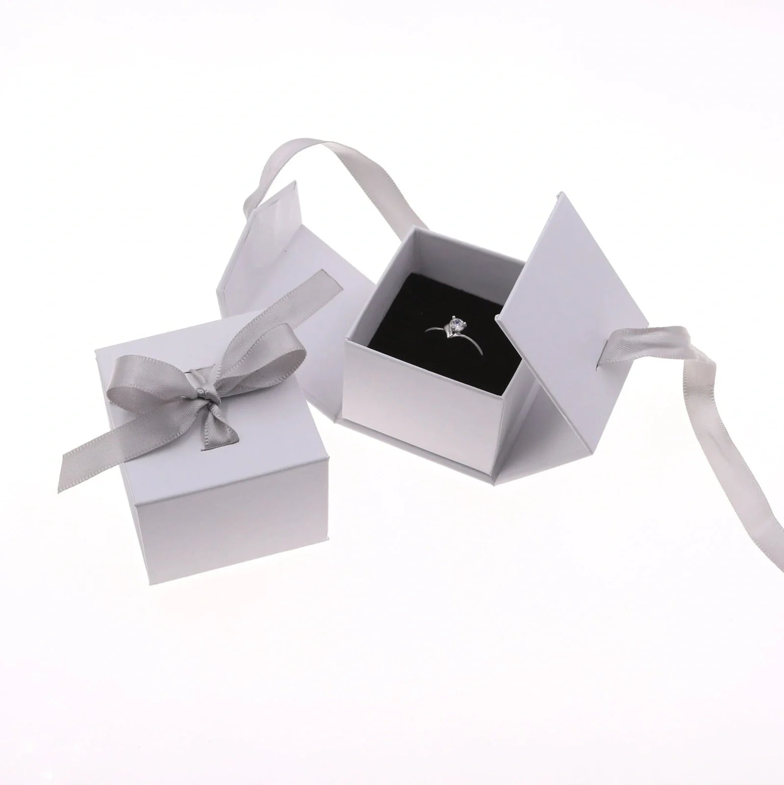 Square grey jewellery gift box with ribbon bow measuring 5x5cm for ring and earring storage