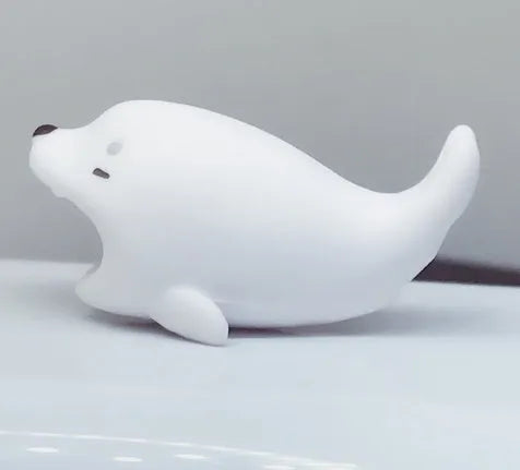 Silicone animal-shaped cable protector for Apple iPhone lightning charging cable.