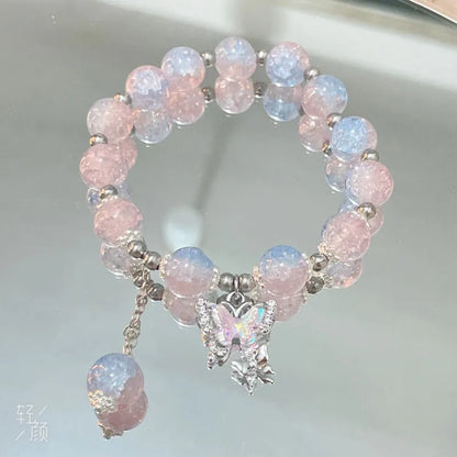 Chinese style glass bead bracelet with bamboo joint design on wrist.