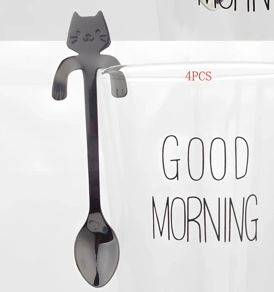Stainless steel coffee spoon with cartoon cat handle design showing 11.7cm measurement scale