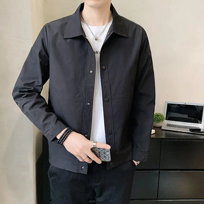Man wearing a lightweight grey Korean-style single-layer polyester jacket for spring.